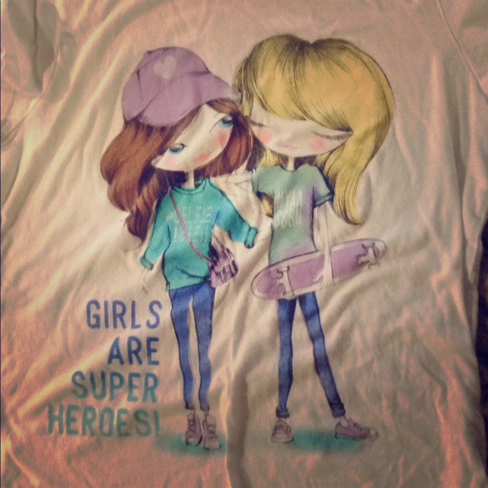 A shirt size large 10/12